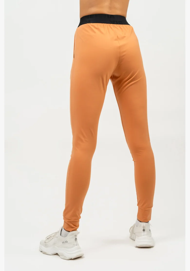 NEBBIA Slim fit legíny s vreckami GYM SPIRIT oranžová