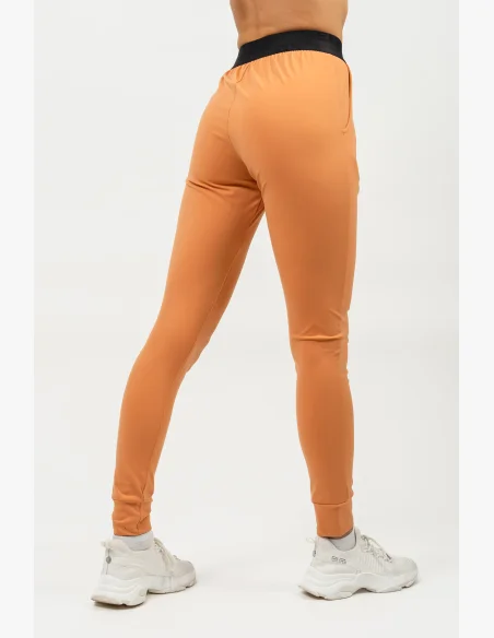 NEBBIA Slim fit legíny s vreckami GYM SPIRIT oranžová