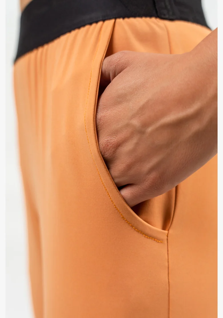 NEBBIA Slim fit legíny s vreckami GYM SPIRIT oranžová