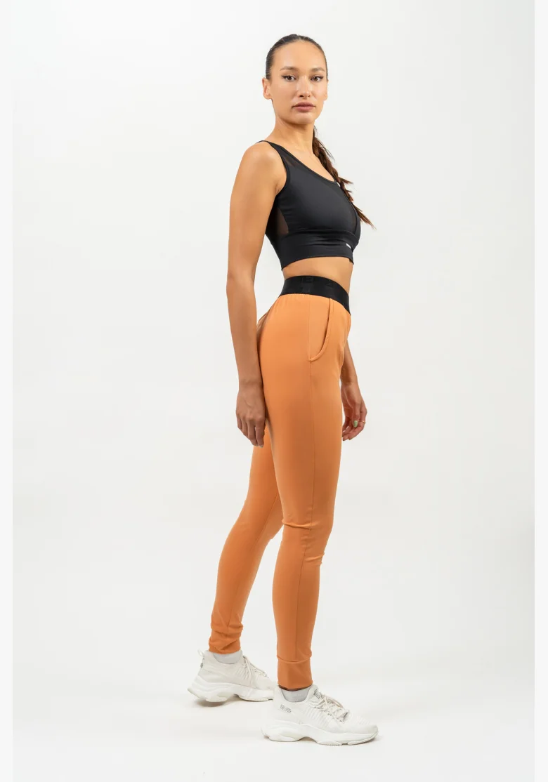 NEBBIA Slim fit legíny s vreckami GYM SPIRIT oranžová