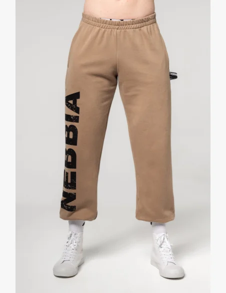 NEBBIA Voľné baggy tepláky s vreckami GYM BRO hnedá
