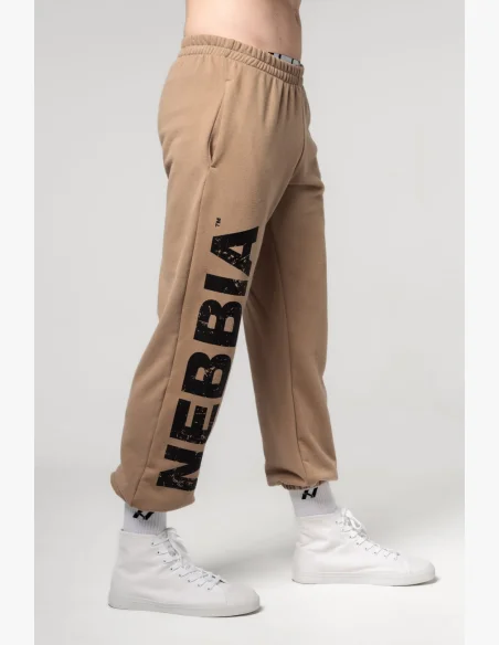 NEBBIA Voľné baggy tepláky s vreckami GYM BRO hnedá
