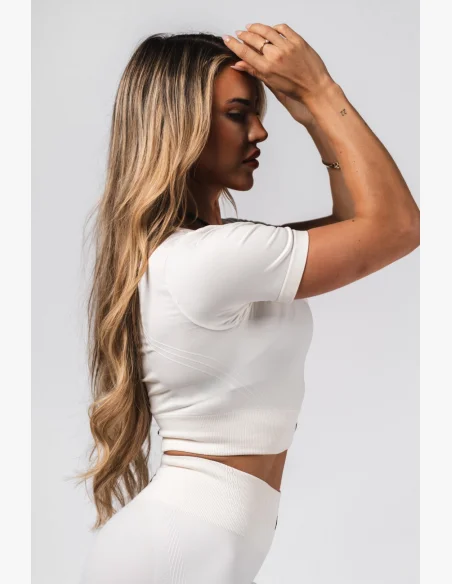 NEBBIA Tvarujúci bezšvový crop top FLOW SEAMLESS krémový